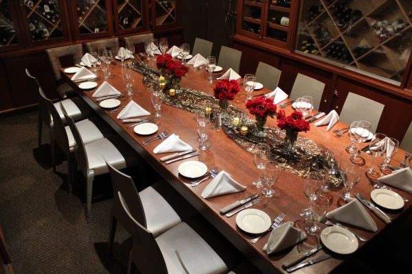 Private dining room at Greystone Steakhouse set for a corporate event in San Diego's Gaslamp Quarter